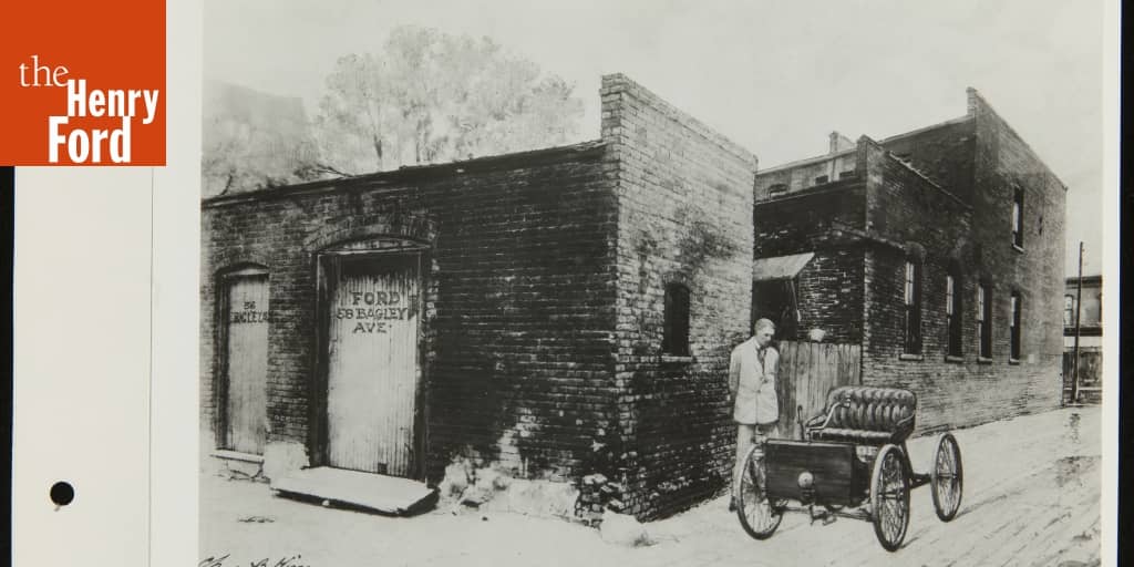 Henry Ford and the 1896 Quadricycle outside 58 Bagley Avenue