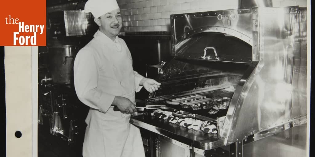 Chef Broiling Steak and Hot Dogs over Ford Charcoal Briquets, 1938